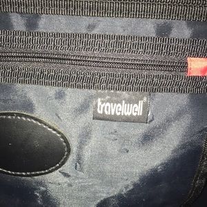Two Travelwell Rolling Unisex Bags